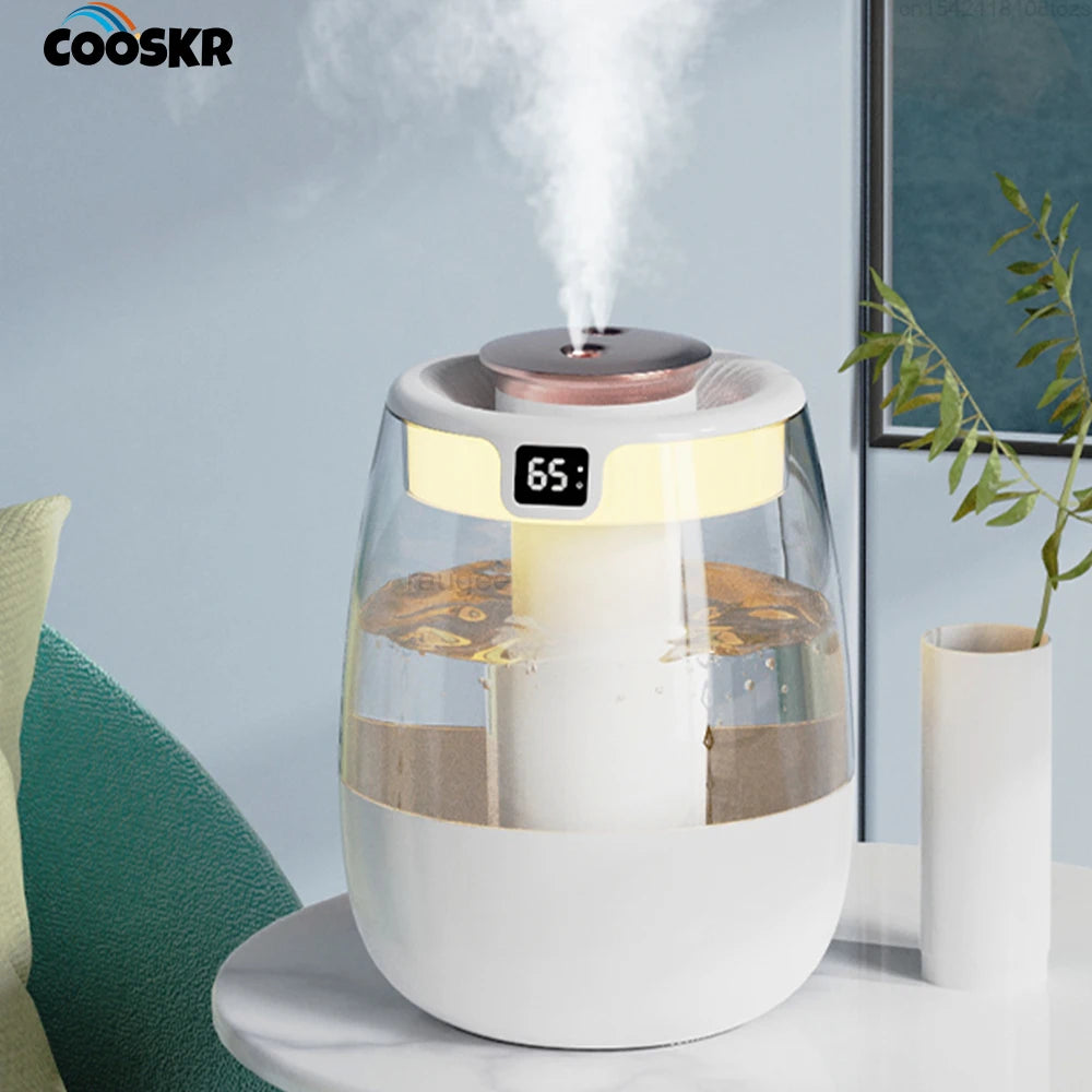 White cool mist humidifier with circular top and visible mist plume